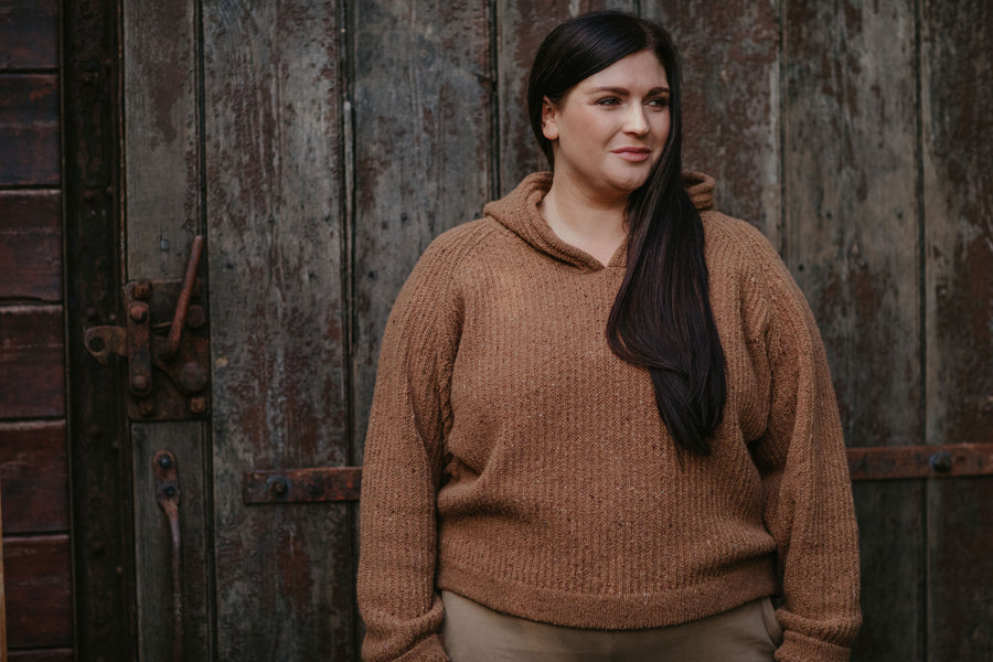 Abby is 5ft 4in/162cm and is wearing The Knit Hoodie in Maple, size L.